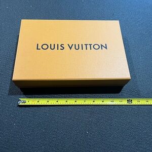 Louis Vuitton orange box, blue ribbon and note card